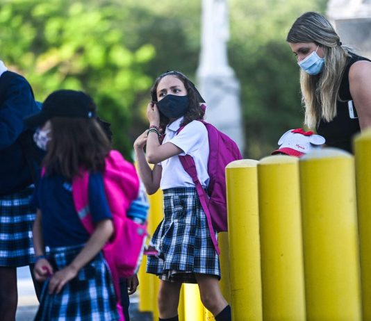 Florida Chiropractor Signs Over 500 Facial Mask Exemptions For Students Despite Covid-19 Surge

