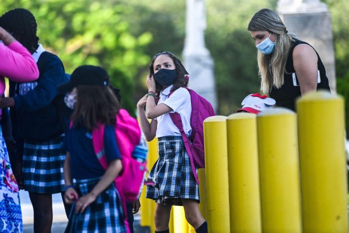 Florida Chiropractor Signs Over 500 Facial Mask Exemptions For Students Despite Covid-19 Surge

