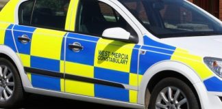 Paramedics treat a woman injured in an accident in Kempsey, Worcestershire

