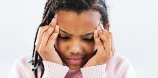 When should you consult a pediatrician about a child's headache?
